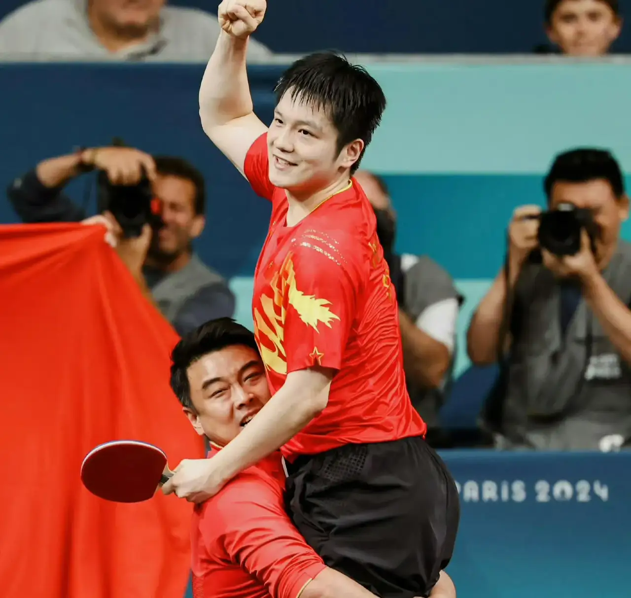 中国乒乓球队力克比利时乒乓球队，王皓送出助攻的简单介绍